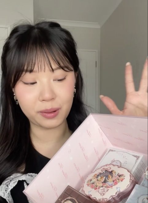 TikTok creator unboxing Flower Knows products, displayed as objects rather than being applied